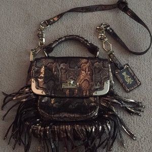 Christian Audigier, Gold metallic cloth w/fringes